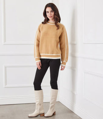 Experience ultimate comfort and style with our Textured Sweater! This brushed sweater is perfect for those who love a fuzzy feel. With a ribbed neck detail, and contrast color lines, it's sure to keep you warm and stylish all day long.