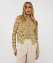 Load image into Gallery viewer, Elevate your wardrobe with the Cira Cardigan Button Lurex by EsQualo. This luxurious gold cardigan features a shimmering lurex fabric, a classic button-front design, and a chic, versatile fit perfect for layering. Whether dressing up or keeping it casual, this stylish knit adds a touch of elegance to any outfit. Shop now for a timeless, fashion-forward look.
