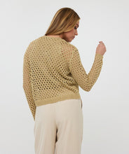 Load image into Gallery viewer, Elevate your wardrobe with the Cira Cardigan Button Lurex by EsQualo. This luxurious gold cardigan features a shimmering lurex fabric, a classic button-front design, and a chic, versatile fit perfect for layering. Whether dressing up or keeping it casual, this stylish knit adds a touch of elegance to any outfit. Shop now for a timeless, fashion-forward look.
