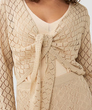 Load image into Gallery viewer, Add this stylish addition to your wardrobe. This tie front cardigan in ajour knit quality is perfect for any occasion - it&#39;s versatile soft gold hue makes it a match for everything in your closet. Layer it over your go-to tank and you&#39;re ready to go!
