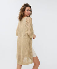 Load image into Gallery viewer, This exquisite gold long open knit cardigan offers endless styling options. It can be effortlessly layered over dresses, tops, or even a swimsuit for a sophisticated look at the pool or beach.
