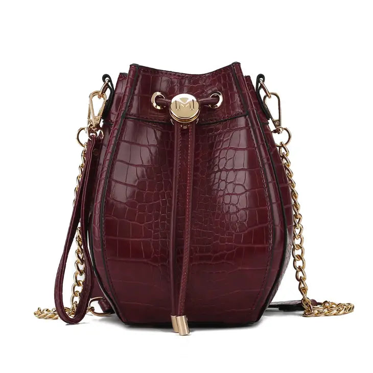 The Cassidy Crocodile Embossed Bag is a stylish and functional shoulder bag designed for women. The bag is made of high-quality animal-friendly vegan leather that is embossed with a crocodile pattern, giving it a unique and fashionable look.
