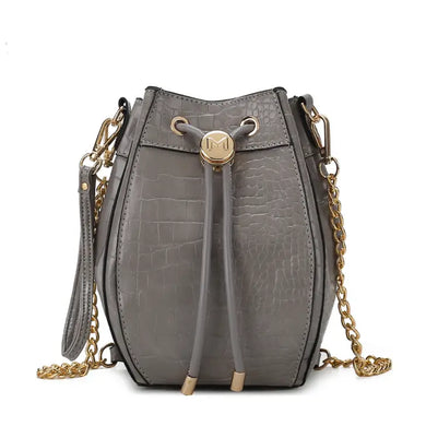 The Cassidy Crocodile Embossed Bag is a stylish and functional shoulder bag designed for women. The bag is made of high-quality animal-friendly vegan leather that is embossed with a crocodile pattern, giving it a unique and fashionable look.