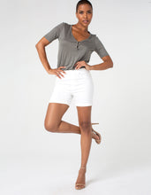 Load image into Gallery viewer, This fabulous hi-rise Chloe rolled cuff short provides all-day comfort and incredible support.  Amazing recovery technology allows you to wear these shorts all day and they won&#39;t bag out. Easy to put on, pair with your favorite top and sandal and go!    Color - White. 4-3/4” Rolled inseam. Hi-rise. Set-in waistband. Faux front pockets; functional back pockets. Amazing stretch with super soft hand-feel.
