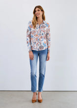 Load image into Gallery viewer, Woman wearing a floral blouse, blue jeans and brown heels against a white background.
