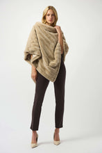 Load image into Gallery viewer, Woman wearing a beige fur poncho, mocha slim fitting pants and off-white heels against a white background.

