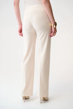 Load image into Gallery viewer, Model wearing a gold chunky bracelet, off-white pull-on wide leg pants and off-white heels against a white background.
