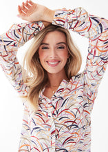 Load image into Gallery viewer, This stylish top is an ideal choice for special occasions and your everyday wardrobe alike. Boasting a colorful, modern and fun design, it features roll up sleeves and smocking detail.  Colors- Colorful Grasses; White, light blue, dark blue, orange, lilac, red. Button down. Roll up tab sleeve. Smock detail on back. Fabric -100% Viscose.
