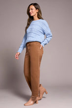 Load image into Gallery viewer, Woman wearing a light blue sweater. brown pants and tan boots against a neutral background.
