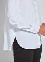 Load image into Gallery viewer, White shirt and black pants against a plain background

