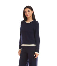 Load image into Gallery viewer, Woman wearing a navy and cream sweater and matching pant against a white background.
