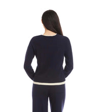 Load image into Gallery viewer, Woman wearing a navy and cream sweater and matching pant against a white background.
