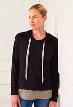 Load image into Gallery viewer, This black Karen Kane hoodie boasts a contrast hem wit dazzling tiny sequins design that elevates its classic style. Crafted with high-quality materials, it offers both comfort and style, making it a perfect choice for any casual occasion. Stay cozy and fashionable with this stylish addition to your wardrobe.
