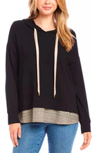 Load image into Gallery viewer, This black Karen Kane hoodie boasts a contrast hem wit dazzling tiny sequins design that elevates its classic style. Crafted with high-quality materials, it offers both comfort and style, making it a perfect choice for any casual occasion. Stay cozy and fashionable with this stylish addition to your wardrobe.
