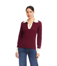 Load image into Gallery viewer, Woman wearing a burgundy sweater with a white collar and jeans against a white background.
