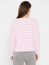 Load image into Gallery viewer, Woman wearing fuzzy pink sweater and gray pants against a white background.
