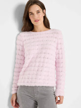 Load image into Gallery viewer, Woman wearing fuzzy pink sweater and gray pants against a white background.
