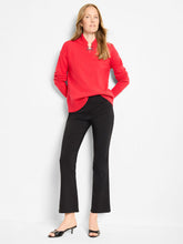 Load image into Gallery viewer, Woman wearing a red sweater, black pants and black heels against a white background.
