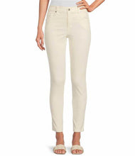 Load image into Gallery viewer, The Zuma Jean from Karen Kane, crafted in a cream shade, is an enduring staple. Its slim fitting silhouette is complemented by a cropped ankle length. For a look that is timeless and polished, the cream hue serves as a practical substitute for white jeans and easily pairs with any top. Color- Cream. Zipper fly button front Ankle length. Slim/Skinny leg. 5 functional pocket construction. Fabric -86% Cotton. 11% Polyester. 3% Spandex.
