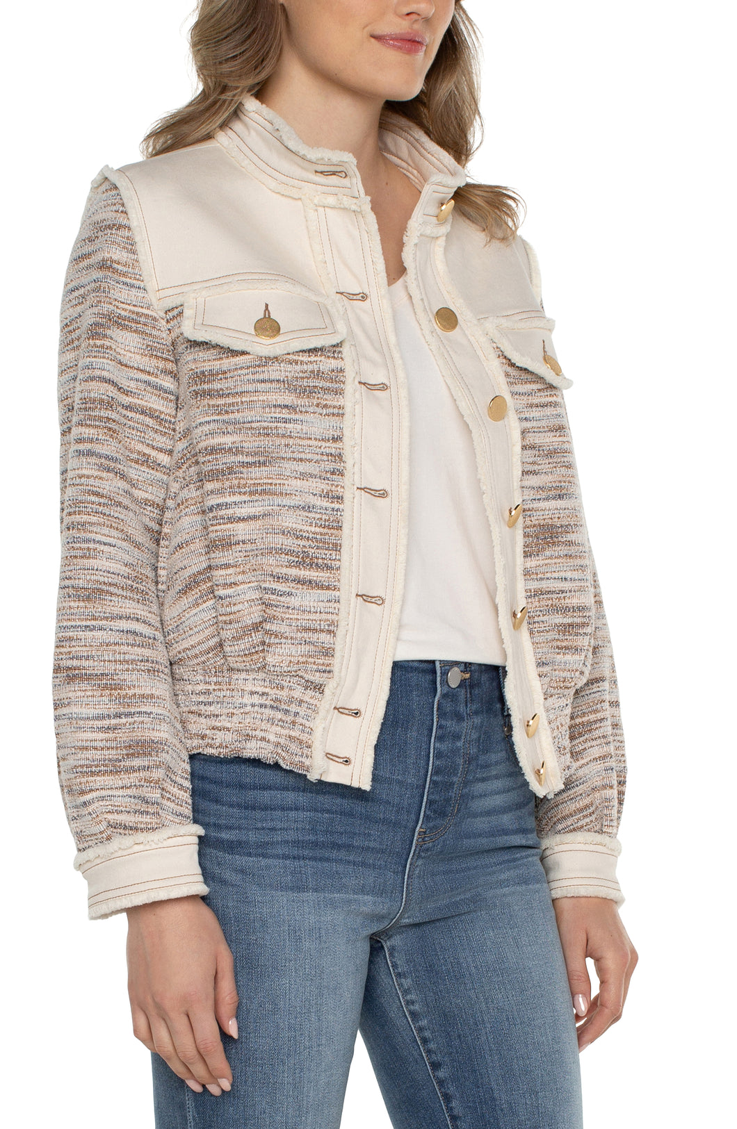 This jacket showcases a stunning combination of slight fray denim and boucle knit. The blend of textures, complemented by the earthy hues and gold metallic accents, creates a distinctive and adaptable garment that will surely be a go-to choice for your wardrobe.  Color- Ecru Multi Boucle. 23-1/2