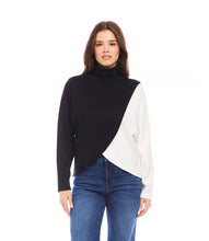 Load image into Gallery viewer, Prepare to embrace stylish comfort with our Crossover Colorblock Top. Crafted from soft sweater knit fabric, this top showcases an asymmetrical hem and dolman sleeves for a laid-back fit. It&#39;s ideal for infusing your wardrobe with character.
