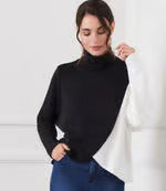 Load image into Gallery viewer, Prepare to embrace stylish comfort with our Crossover Colorblock Top. Crafted from soft sweater knit fabric, this top showcases an asymmetrical hem and dolman sleeves for a laid-back fit. It&#39;s ideal for infusing your wardrobe with character.
