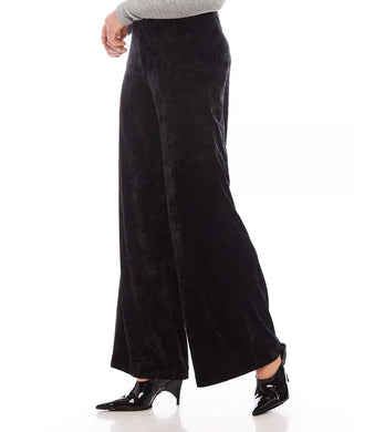 Discover our Crushed Velvet Pants, crafted from a plush, stretchable fabric for supreme comfort. Ideal for any event, these pants will enhance your collection with their sumptuous texture.