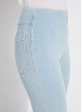 Load image into Gallery viewer, Step into effortless elegance with the Lysse Crystal Embellished Ankle Babyboot. Designed with a flattering 27-inch inseam, this chic denim pant seamlessly blends comfort and sophistication. The subtle crystal embellishments add a touch of sparkle, making these perfect for both everyday wear and special occasions.
