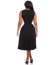 Load image into Gallery viewer, Colorblock panels flatter your figure while offering a cool modern touch to this soft jersey-knit midi dress. Its midi silhouette comfortably flows over the body in streamlined sophistication. Colors- Black and white. Colorblock. Sleeveless. Center back invisible zipper. Fabric -90% Rayon. 10% Spandex.
