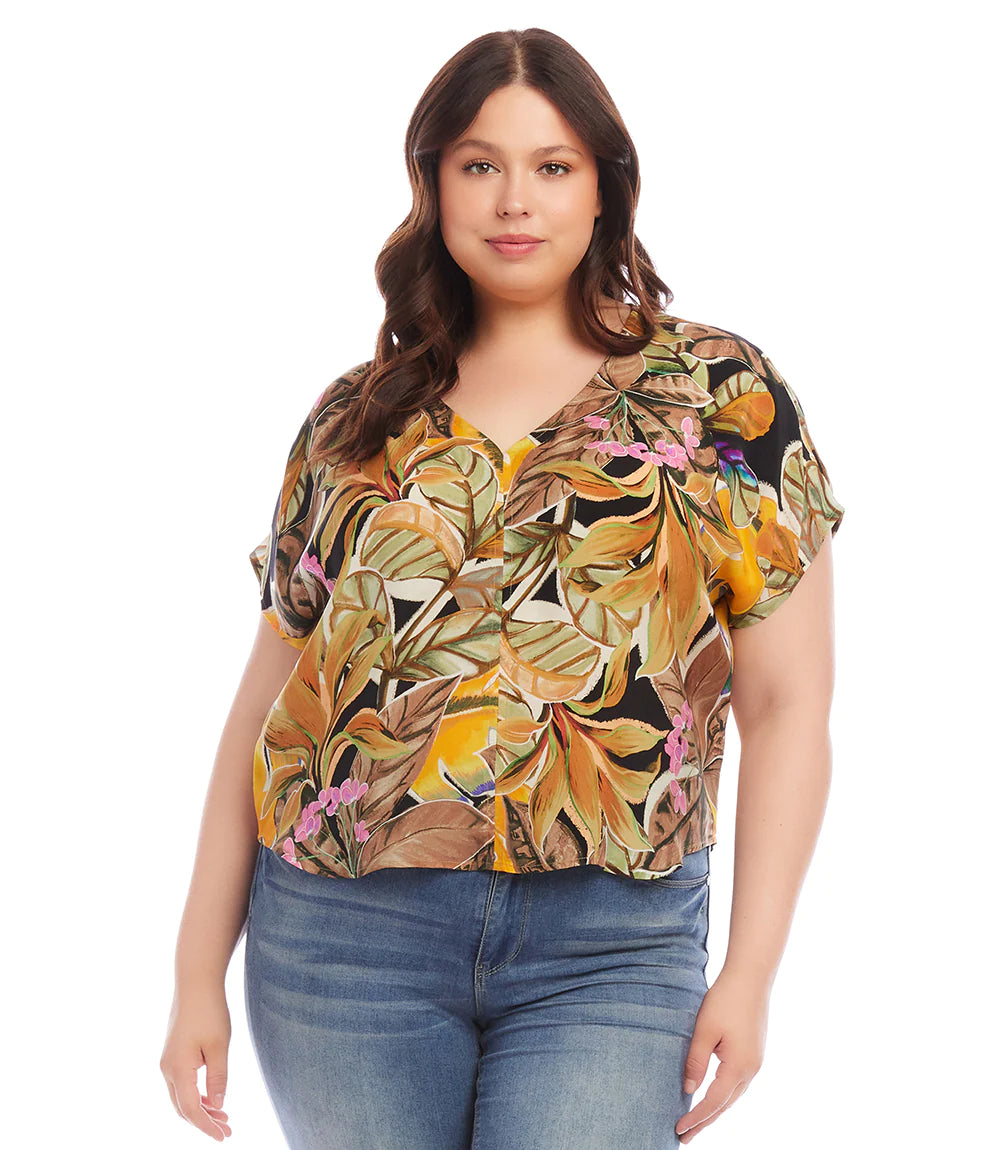 Expertly crafted from luxurious cupro fabric, this top combines tropical charm with a relaxed sophistication. The Dolman sleeves add a touch of casual elegance, creating a comfortable and laid-back fit that effortlessly complements your style. With its vibrant and breezy design, this top is perfect for any occasion.