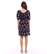 Load image into Gallery viewer, This colorful daisy print tiered dress is a simple breeze to don and style. An adjustable sash at the waist creates curves for an alluring fit. Color- Berry and navy. Daisy print. Knee-length. Scoop neck. Side pockets. Fabric - 100% Viscose.
