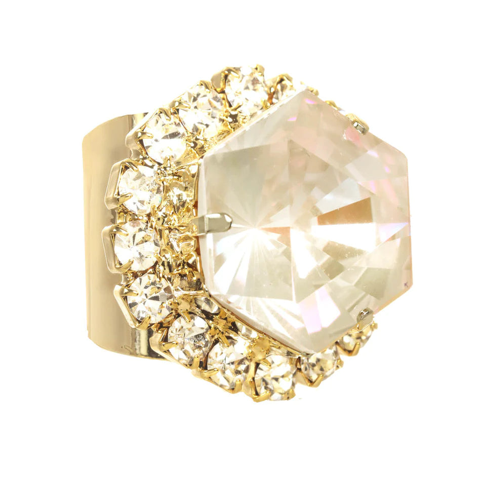 This dazzling Dariana Ring is sure to turn heads and add a special spark to your outfit. Crafted in Canada with high-grade crystal elements and gold-plated base, it's designed for a perfect fit. Put the finishing touch on your look with this must-have accessory! Color- Beige. High quality crystals. Gold plating over brass. One size, adjustable.