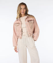 Load image into Gallery viewer, This uniquely designed jean jacket is sure to turn heads. Its intricate embroidery adds a touch of femininity to the cool outerwear. Each embroidery features bronze crystals for extra shine.
