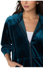 Load image into Gallery viewer, This fabulous hoodie features a velour fabrication in a rich teal blue hue, providing a classic, stylish look with an unmatched level of comfort. A zip down closure and hood with drawstrings let you adjust the fit, while the kangaroo pockets add a convenient touch. This is the perfect hoodie for everyday wear. Create the perfect outfit when paired with our Palma Pull On Wide Leg Pant with Drawcord Dark Teal - Liverpool Los Angeles   Color- Dark teal. Hoodie. Drawcord. Relaxed fit.
