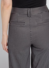 Load image into Gallery viewer, Close up photo of back view of black sheen line jean.

