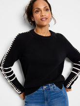 Load image into Gallery viewer, This pullover brings a unique touch to daily wear with its whipstitch detailing along the sleeves and contrasting white stripes on the cuffs. Crafted from a plush version of ultra-soft Zephyr yarn, this sweater provides comfort without sacrificing style. Designed with an easy fit, round neckline, and raglan sleeves, it accentuates a feminine silhouette. The high-low hemline rests at the hip, providing additional coverage at the back.
