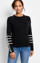 Load image into Gallery viewer, This pullover brings a unique touch to daily wear with its whipstitch detailing along the sleeves and contrasting white stripes on the cuffs. Crafted from a plush version of ultra-soft Zephyr yarn, this sweater provides comfort without sacrificing style. Designed with an easy fit, round neckline, and raglan sleeves, it accentuates a feminine silhouette. The high-low hemline rests at the hip, providing additional coverage at the back.
