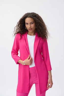 Update your style with this modern, dazzling pink blazer. A relaxed matte twill fabric with side slit detail offers soft tailoring, while the notched collar and three-quarter cuffed sleeves give structure to the longline silhouette.   Color- Dazzling pink. Longer design. No buttons. Three quarter cuffed sleeves. Side slits. Notched collar. Fabric - 100% Polyester.