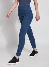 Load image into Gallery viewer, The ankle-length Denim Legging, crafted from 4-way-stretch Knit Denim, boasts a concealed patented waistband and a flattering, slimming silhouette. It&#39;s no surprise that these denim leggings are some of Lysse&#39;s bestsellers.
