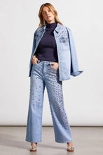 Load image into Gallery viewer, This striking sparkle and shine denim shirt perfectly brings together casual style with glamorous flair, adorned with striking rhinestone details in clear, pink, and red. It boasts a snap-up front, long sleeves with open cuffs, a crisp collar, and practical chest pockets, making it as functional as it is fashionable.&nbsp;
