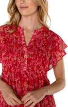 Load image into Gallery viewer, A lightweight double layered chiffon blouse featuring a gorgeous, eye-catching print and flutter sleeves. It can be easily layered under a denim jacket or worn on its own!
