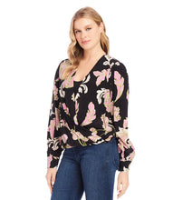 Load image into Gallery viewer, Crafted from high-quality crepe material, this Dariana Drape Front Top in Pink Multi Floral Print boasts an elegant chalk floral print. Effortlessly chic, it can be paired with your favorite jeans or trousers for a stylish look, or complete the ensemble with our matching Brissa Bias Cut Midi Skirt in Pink Floral Print for a versatile and feminine outfit.
