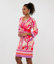 Load image into Gallery viewer, Make a statement with the EsQualo Disco Hit Dress, designed for effortless elegance and bold style. This sleeveless dress features a round neckline and dazzling bead embellishments, adding a touch of glamour to your wardrobe. The multicolored abstract print blends vibrant hues of pink, red, orange, cream and purple creating a playful yet sophisticated look.
