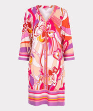 Load image into Gallery viewer, Make a statement with the EsQualo Disco Hit Dress, designed for effortless elegance and bold style. This sleeveless dress features a round neckline and dazzling bead embellishments, adding a touch of glamour to your wardrobe. The multicolored abstract print blends vibrant hues of pink, red, orange, cream and purple creating a playful yet sophisticated look.
