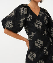 Load image into Gallery viewer, Model wearing puff sleeve black and silver floral print jacquard dress against a white background.
