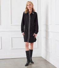 Load image into Gallery viewer, This shirtdress, with its distinctive squiggle edge stitching, provides a fashionable and contemporary update to a traditional style. The playful stitching detail makes it an ideal choice for both professional and casual environments. Create a simply stunning outfit when you style with a pair of tall boots.
