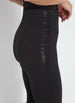 Load image into Gallery viewer, Crafted from 4-way stretch Ponte, the Elysse Embellished Crystal Pant boasts an elegant fit-and-flare leg, expertly skimming the hips and thighs. The sparkling rhinestones lining the waist to hem add a touch of glamour to these timeless black bottoms. Features include a patented concealed waistband, easy pull-on styling, and a blind hem for simple alterations.
