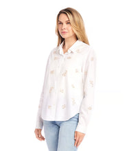 Load image into Gallery viewer, Enhance your closet with our expertly hand-embroidered embellished button up shirt. Delicately hand stitched flowers in a soft almond hue decorate this classic off white garment, adding a refined and sophisticated touch.
