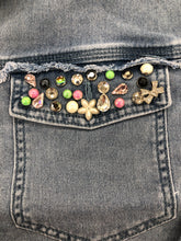 Load image into Gallery viewer, There&#39;s really no need to wear jewelry when you wear this fabulous denim shacket. The classic denim shacket gets a refreshing update this season with eye-catching rhinestone embellishments in all sorts of colors and shapes meticulously set on the collar and pockets. Wear this statement piece and be prepared to get noticed!
