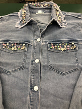 Load image into Gallery viewer, There&#39;s really no need to wear jewelry when you wear this fabulous denim shacket. The classic denim shacket gets a refreshing update this season with eye-catching rhinestone embellishments in all sorts of colors and shapes meticulously set on the collar and pockets. Wear this statement piece and be prepared to get noticed!
